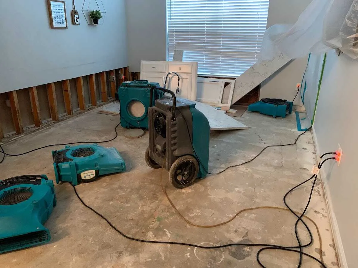 Dehumidifier in flood-cut room for Water Damage Restoration in Glen Ridge