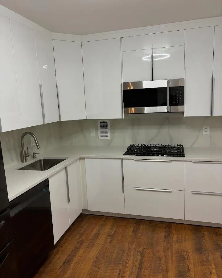 Restored kitchen with white cabinets after water damage in Glen Ridge